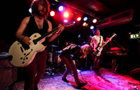 2009-05-16 - The (International) Noise Conspiracy från Guitars, Umeå